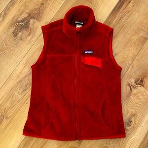 Patagonia re-tool fleece vest W size medium.  Dark reddish orange color.